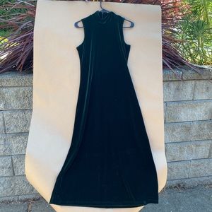 Timeless deep green velvet dress.